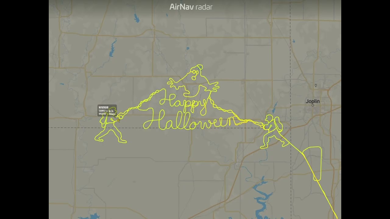 Kaart van AirNav Radar met de vliegroute in de vorm van Happy Halloween, een spook en twee Ghostbusters ten westen van Joplin